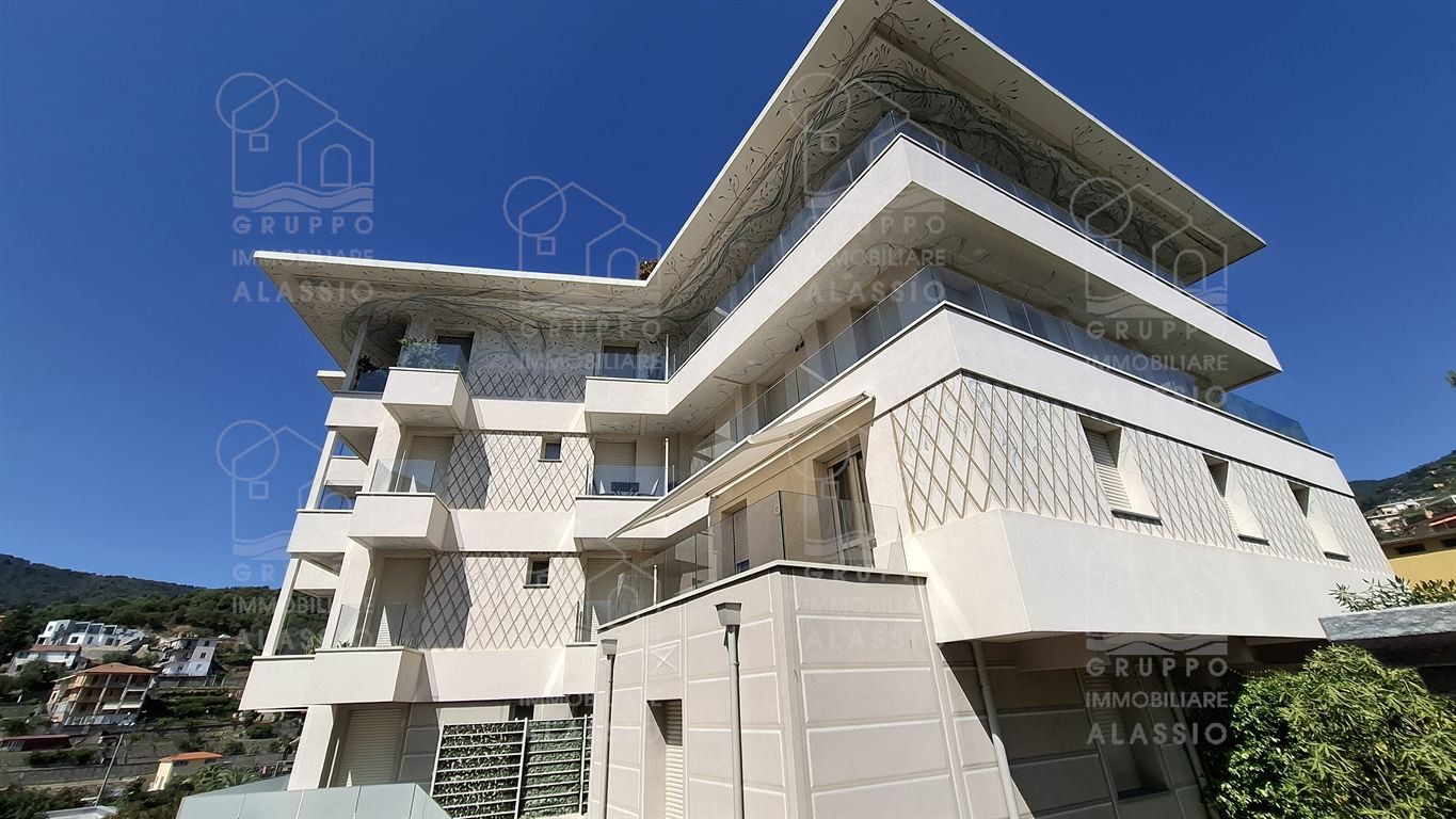 BILOCALE CON TERRAZZO E POSTO AUTO